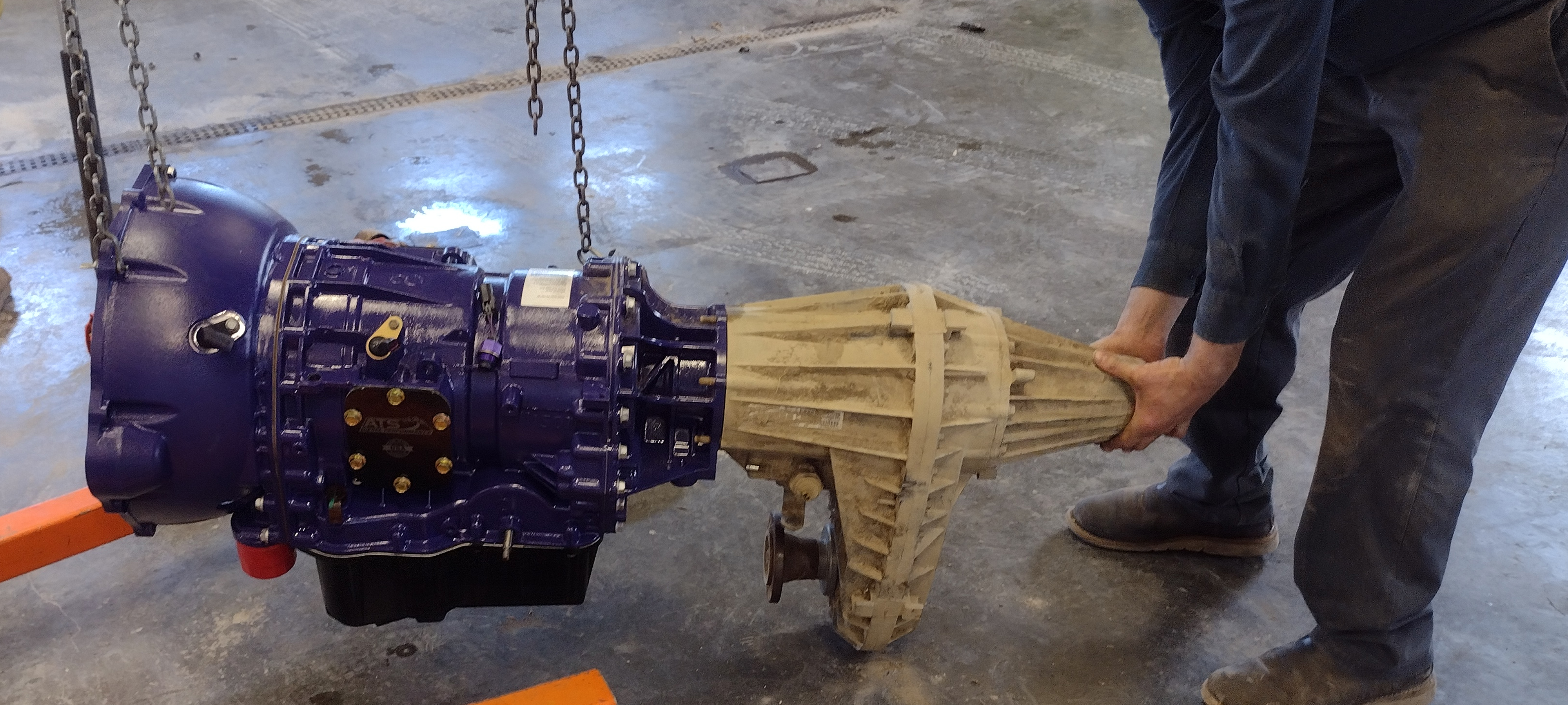 Mechanic servicing a car engine